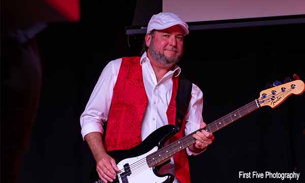 Mark Cummings as John McVie